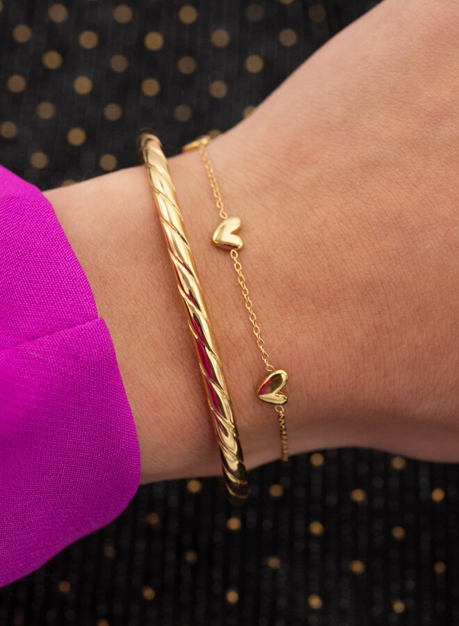 Subtiele armband drie harten