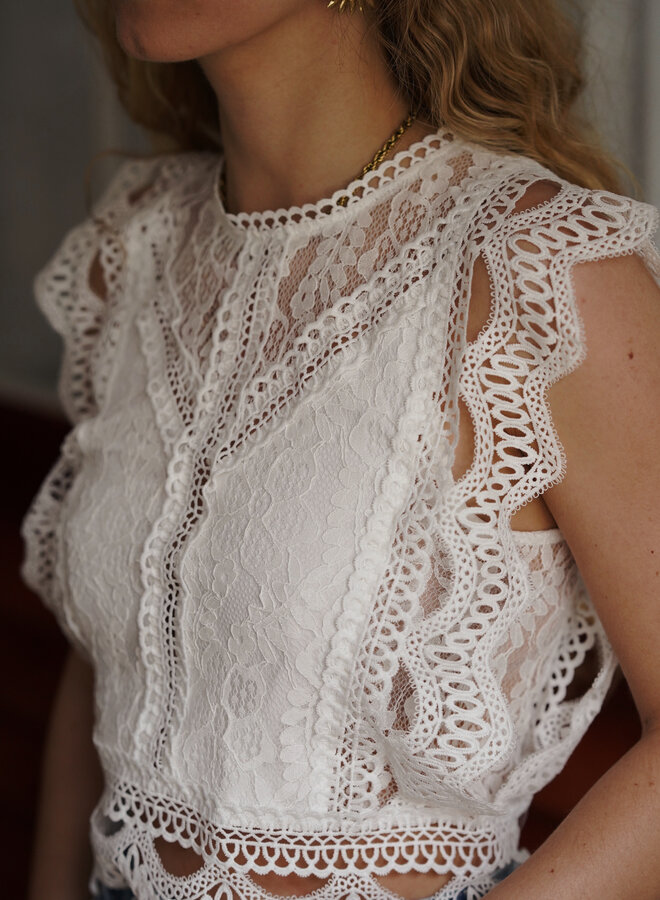 Mouwloze top broderie wit