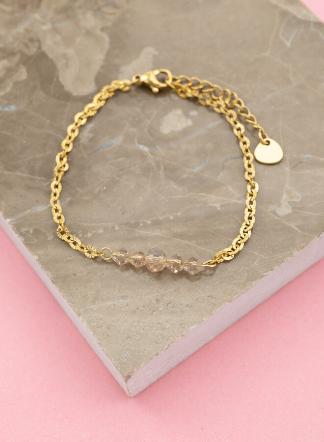 Bedel armband beige beads goud