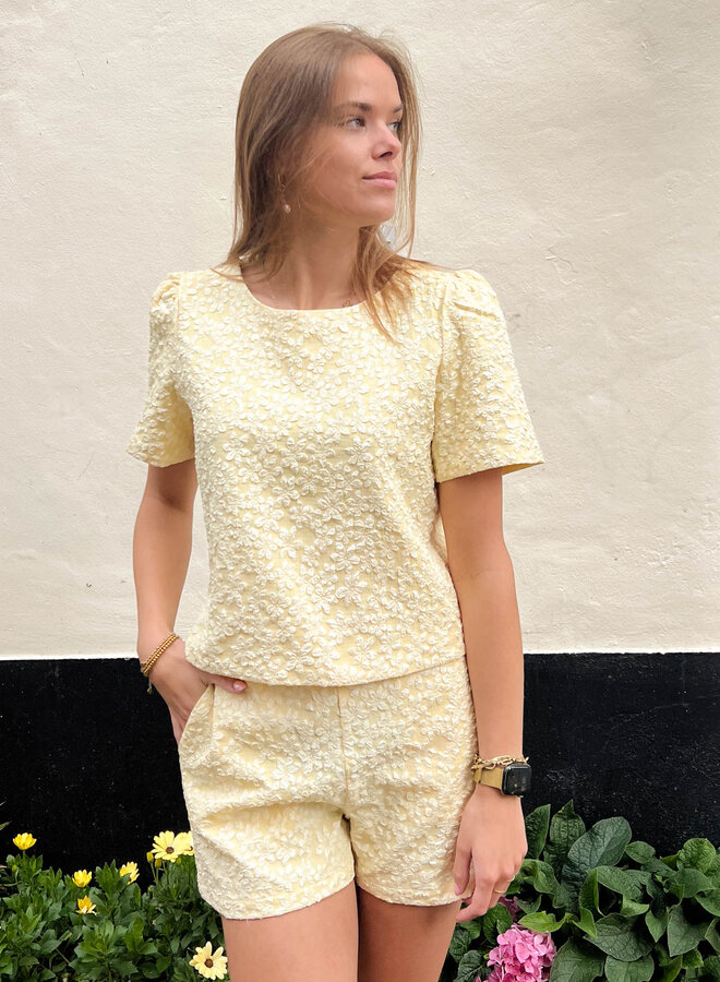 Top peplum geel