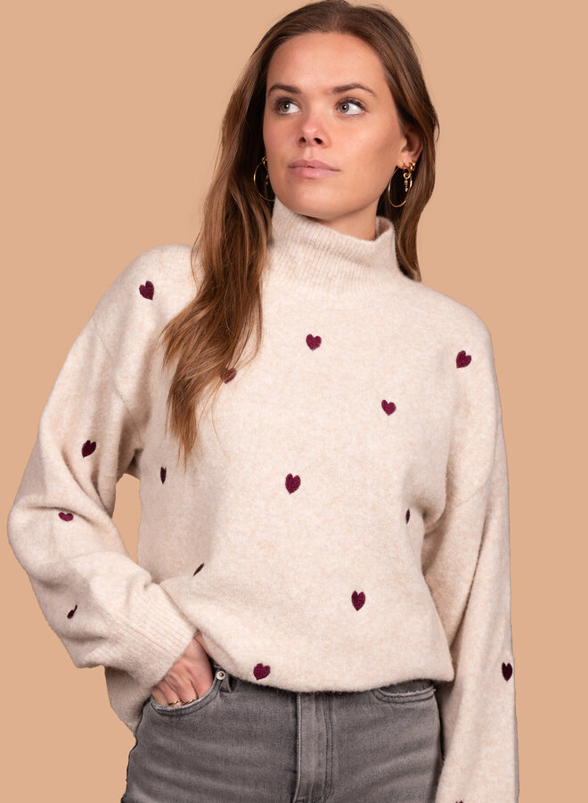 Warme trui hartjes creme
