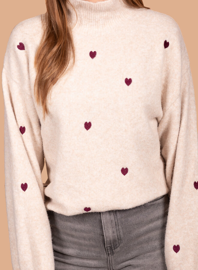 Warme trui hartjes creme