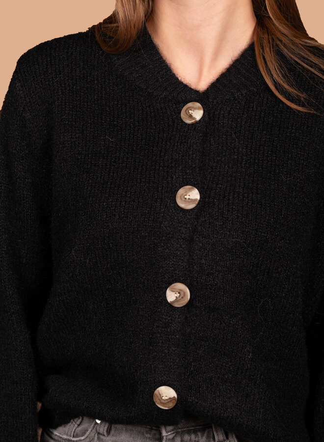 Warm vest parelmoer knopen zwart