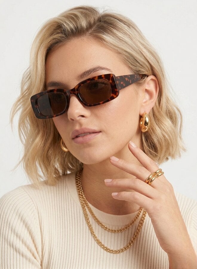 Zonnebril sun is out bruin