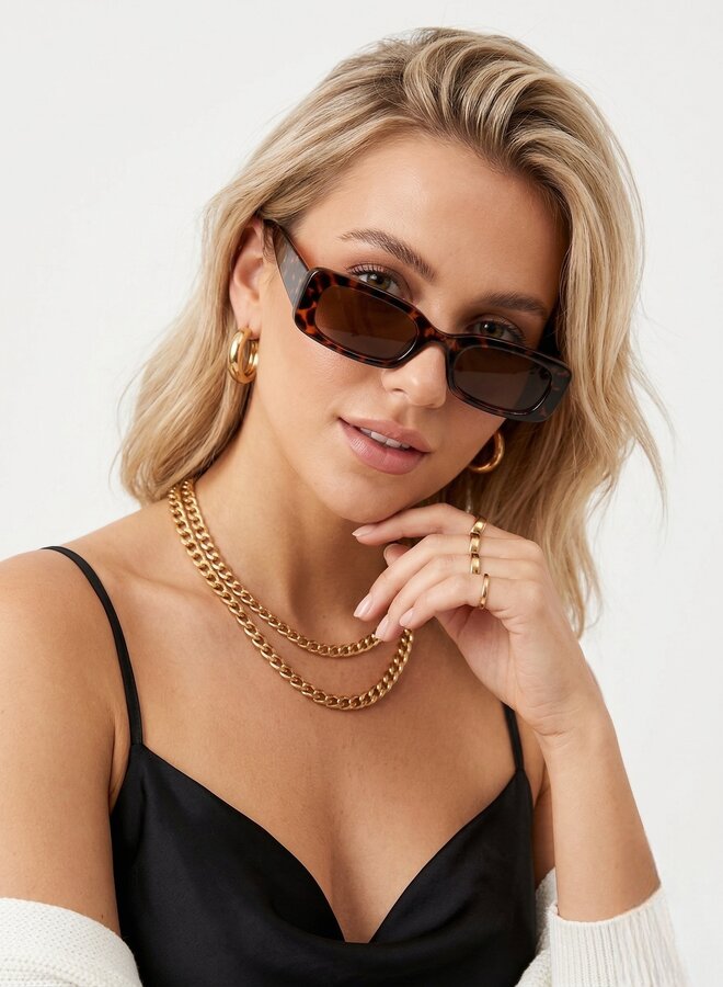 Zonnebril sun is out bruin