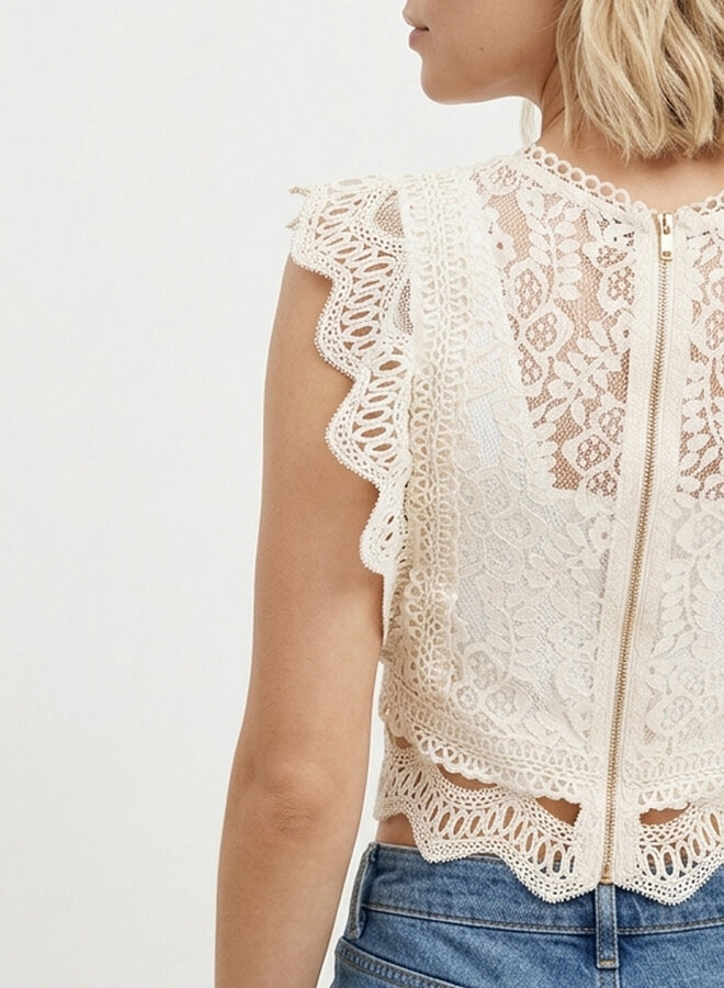 Mouwloze top broderie beige