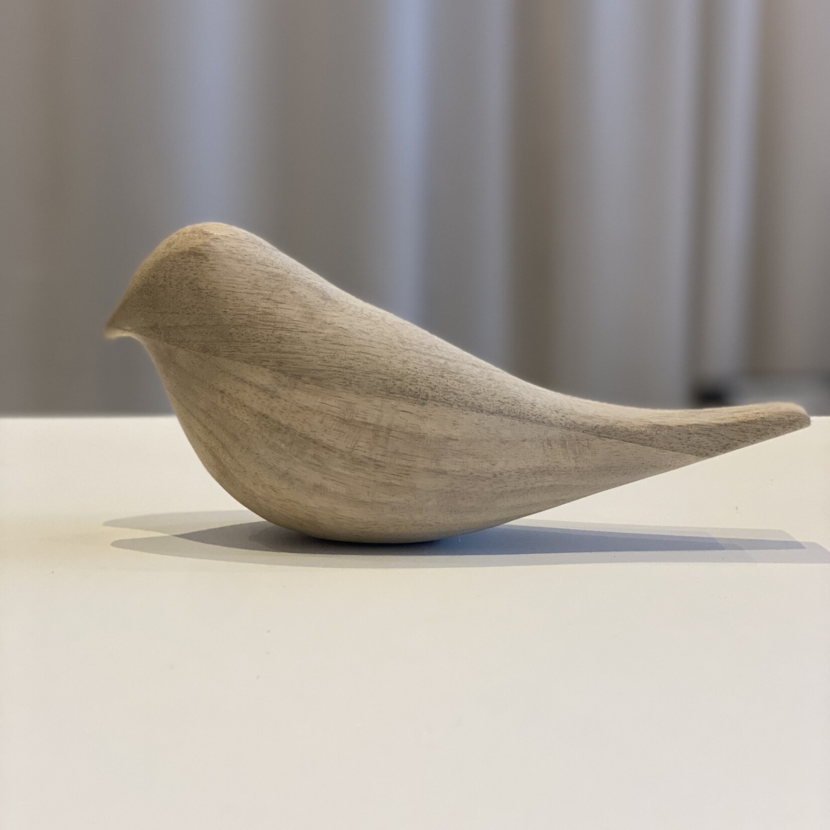 Houten beeldje vogel