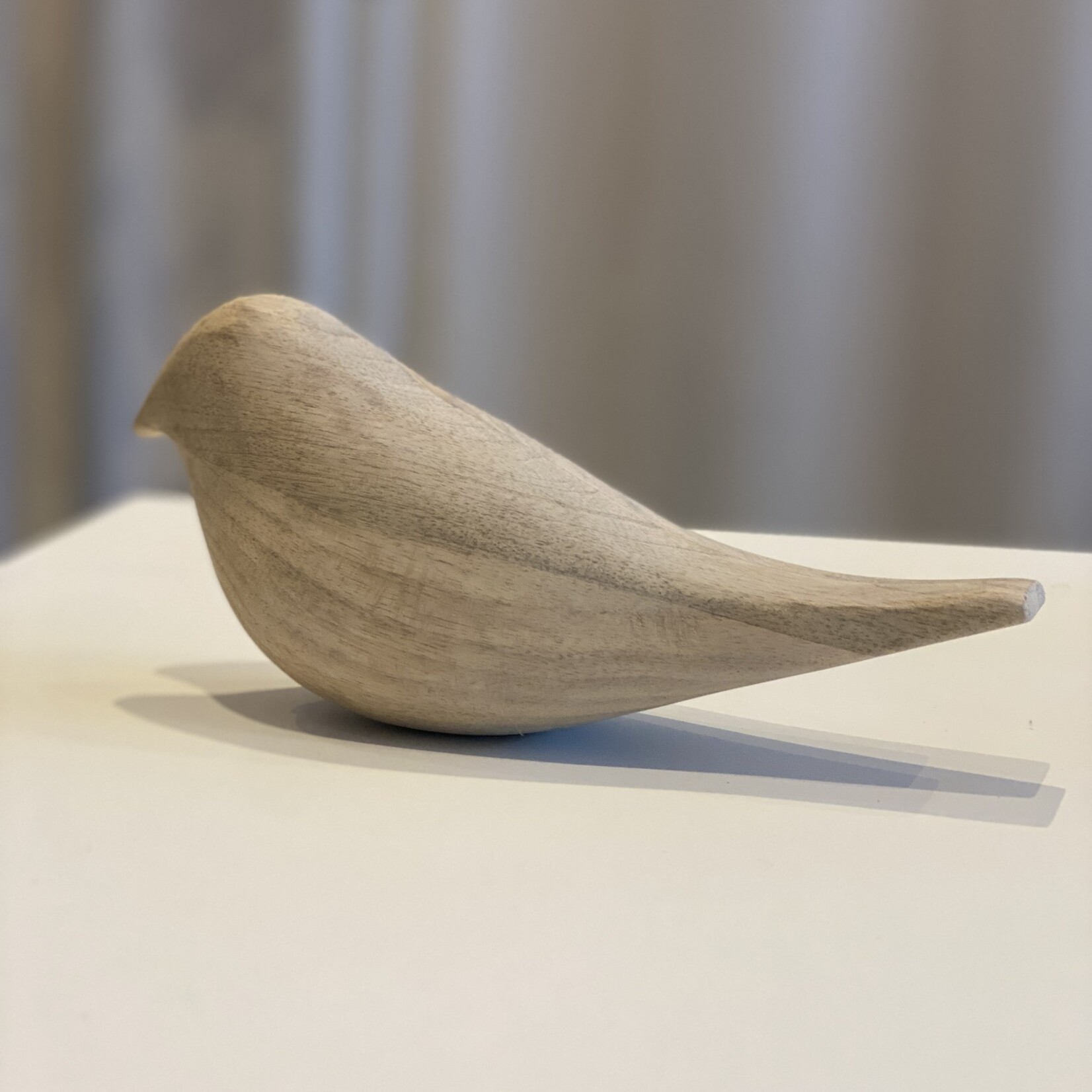 Houten beeldje vogel