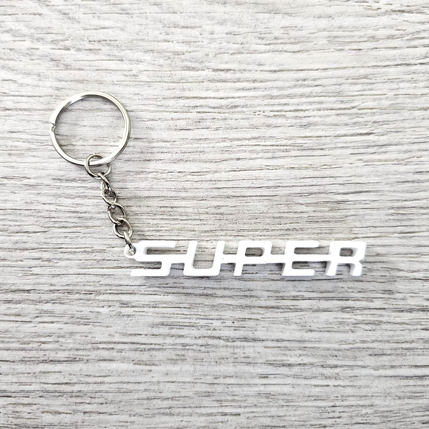 ONLY WAY IS DUTCH Keychain SUPER logo white