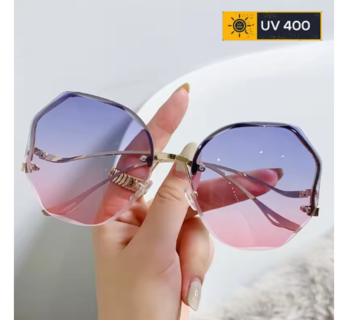 LaGloss Lagloss® Randloze Gradiënt Dames Zonnebril – Trend Hexagon Vorm in Gradiënt Blauw Rose – UV400 Modebril