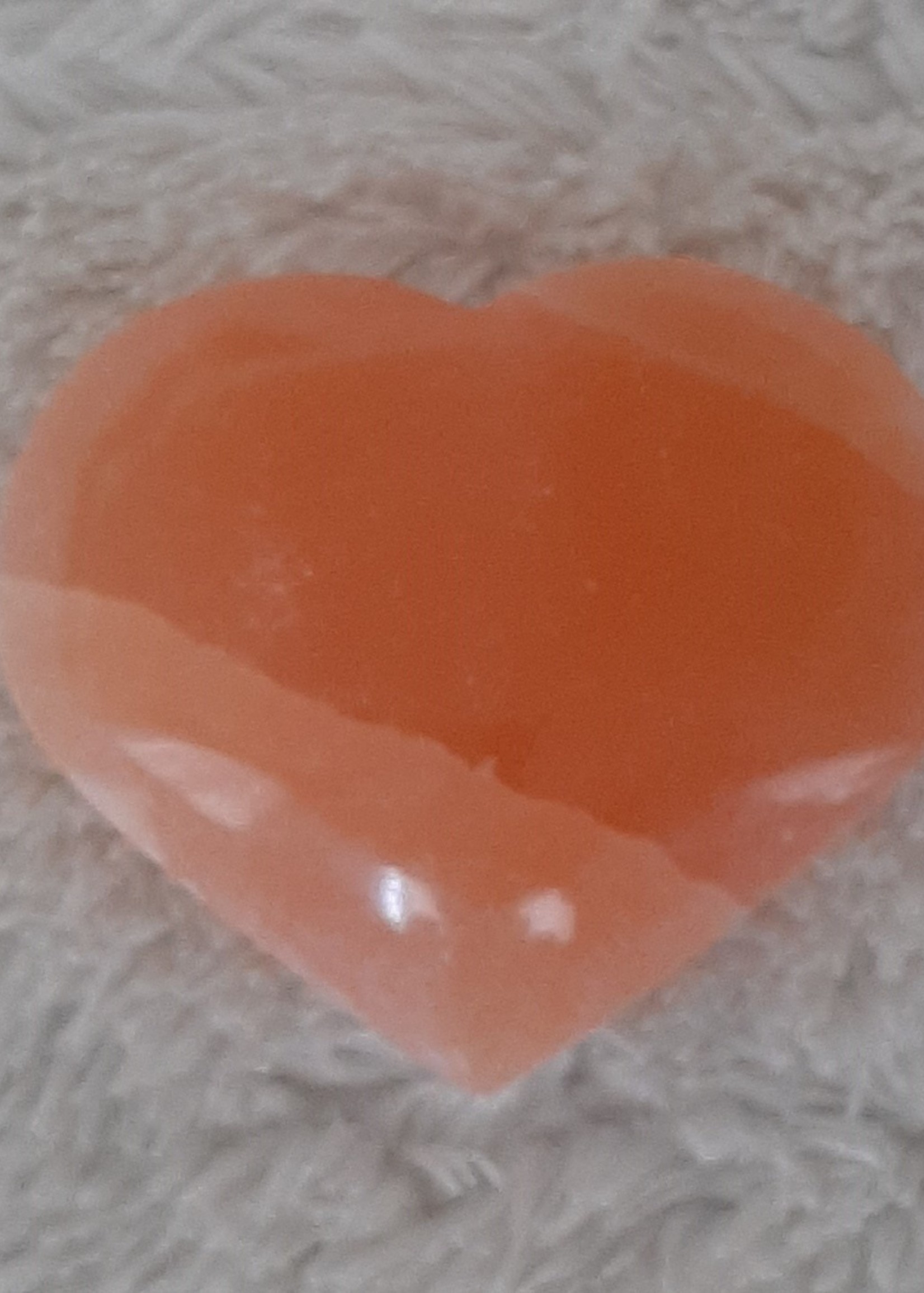 Hug stone heart selenite orange 6,5 x 6 cm