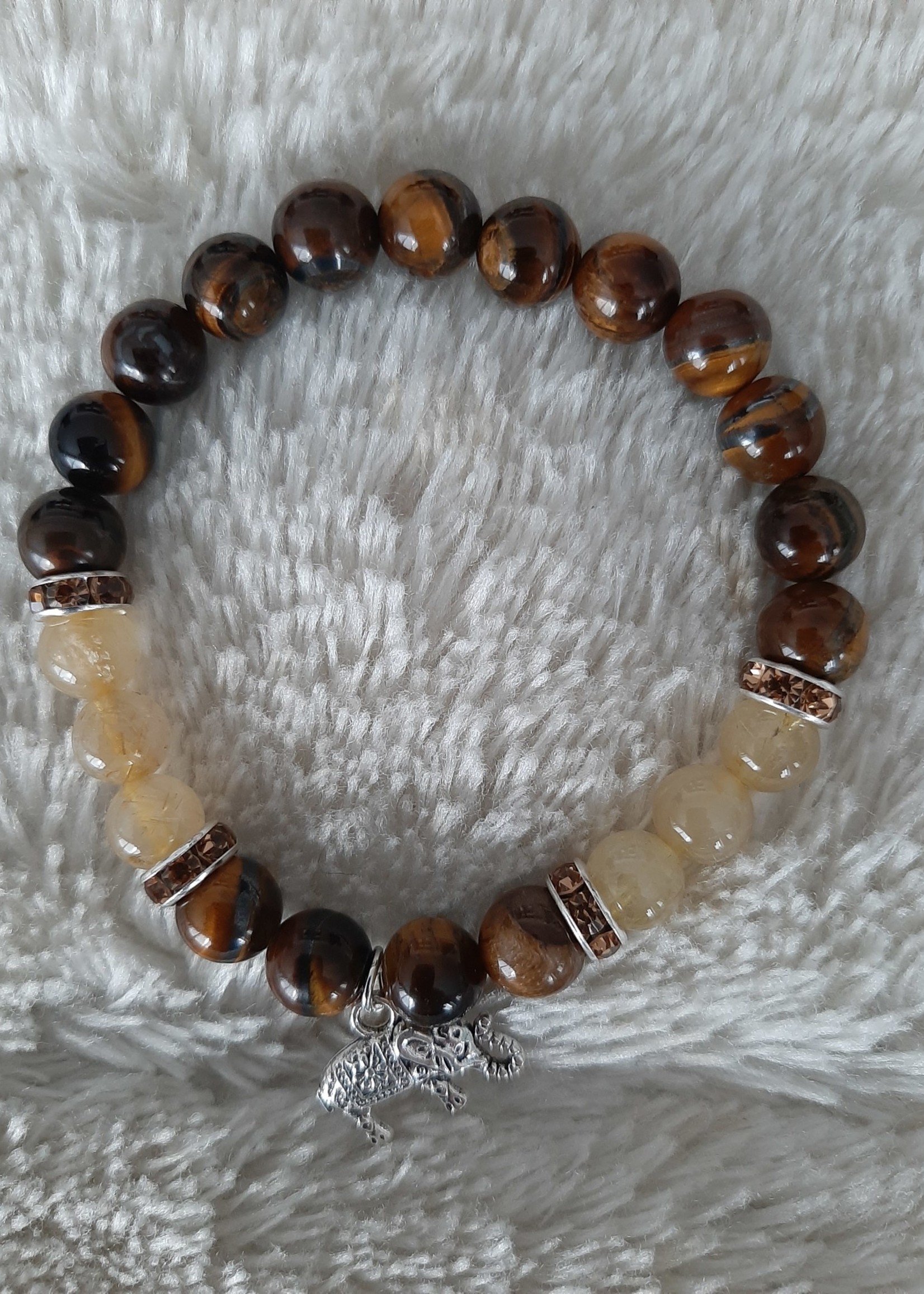 Bracelet Tigereye/Rutile quartz with elephant charm