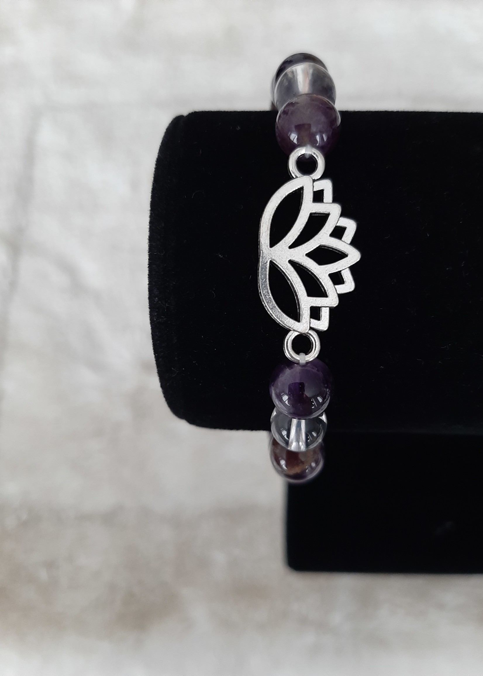 Bracelet Chevron Amethyst/Rock crystal with lotus charm