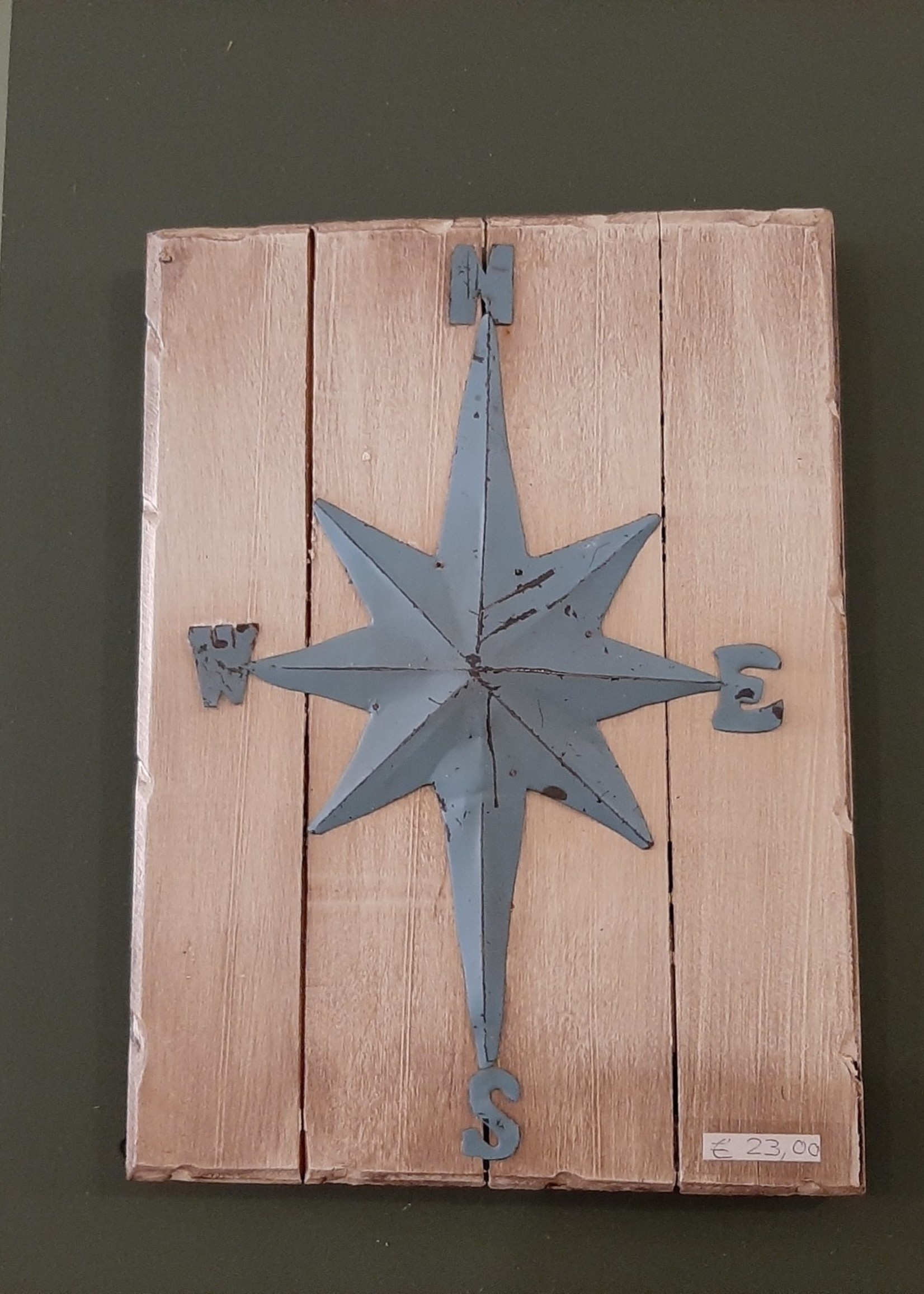 Wooden board with wind rose