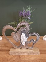 Sculpture 4 coeurs en métal avec socle en bois