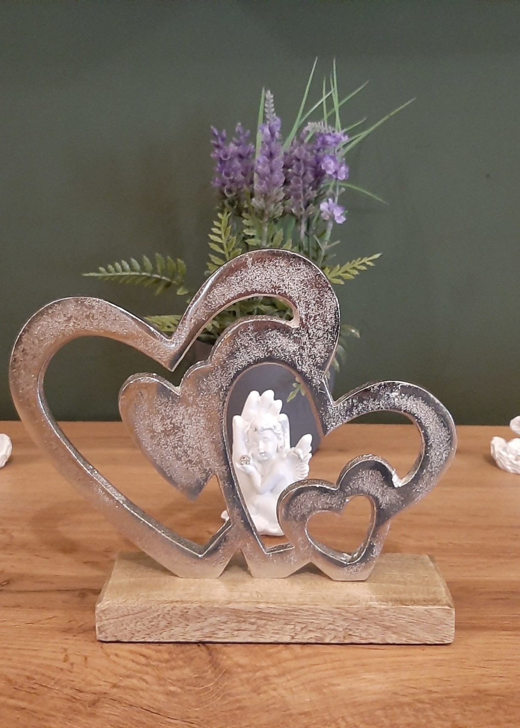 Metal 4 hearts sculpture with wooden base