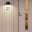 Plejd Wall light black with power outlet