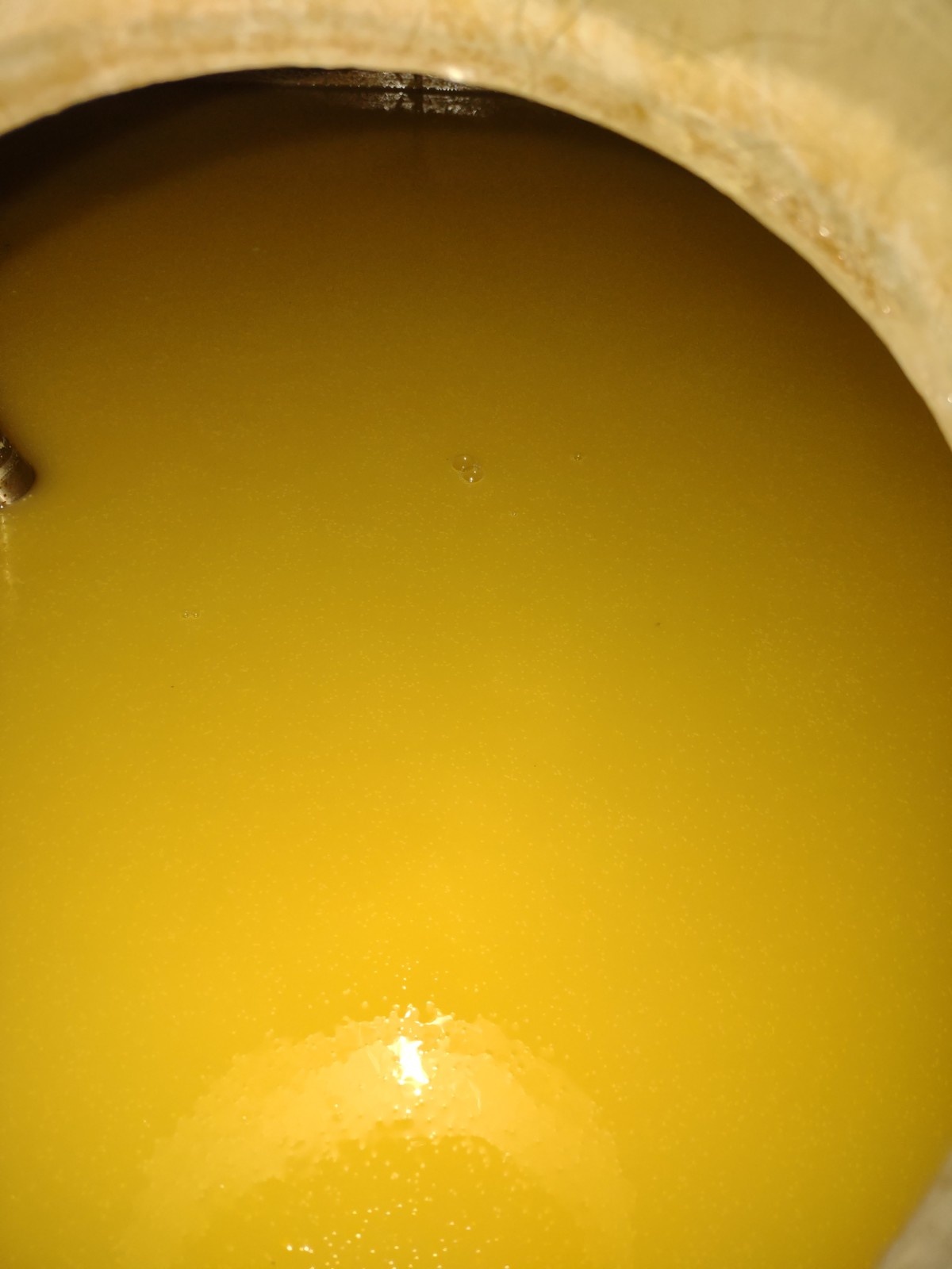 View inside the iStill of fermenting sugar cane juice