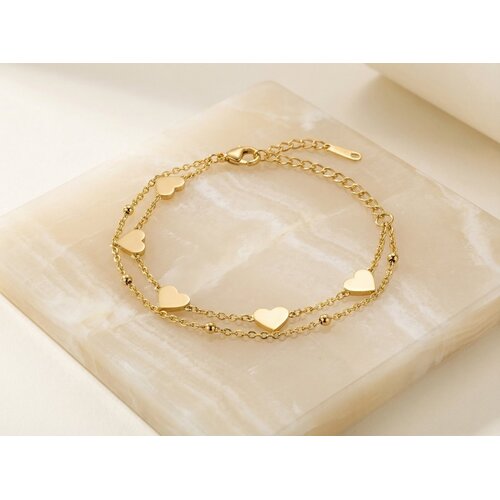 Lundholm Lundholm Lisan Armband Dames Goudkleurig – Premium Stainless Steel Jewellery – Dubbellaagse Bedelarmband met Hartjes en Balletjes – Lisan Serie – Cadeau voor Haar – Scandinavisch Design Lundholm Lundholm Lisan Armband Dames Goudkleurig – Premium Stainless Steel Jewellery – Dubbellaagse Bedelarmband met Hartjes en Balletjes – Lisan Serie – Cadeau voor Haar – Scandinavisch Design