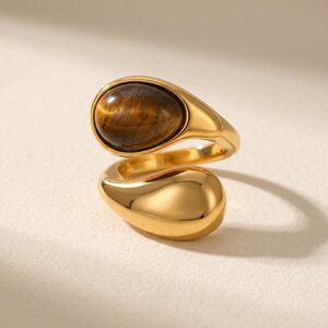 Lundholm Lundholm Luxe Ring Dames Tijgeroog Statement Ring Goud - Premium Stainless Steel - Verstelbare Ring Tijger Oog Bruin - Vrouwen Cadeautjes - Tiger Serie - Scandinavisch Design Lundholm Lundholm Luxe Ring Dames Tijgeroog Statement Ring Goud - Premium Stainless Steel - Verstelbare Ring Tijger Oog Bruin - Vrouwen Cadeautjes - Tiger Serie - Scandinavisch Design