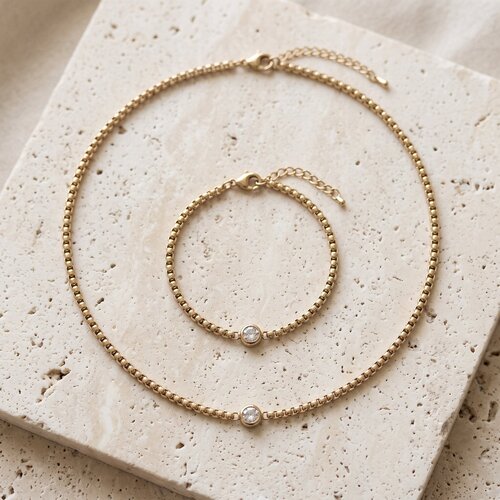 Lundholm Anah – Zirkonia Sieradenset met Ketting en Armband – Goudkleurig Lundholm Anah – Zirkonia Sieradenset met Ketting en Armband – Goudkleurig