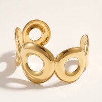 Ines – Brede Statement Cuff met Open Cirkels – Goudkleurig