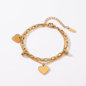 Lundholm Dolly – Dubbele Armband met Hartjes Bedels – Goudkleurig Lundholm Dolly – Dubbele Armband met Hartjes Bedels – Goudkleurig