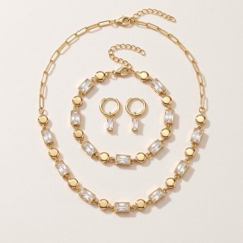 Lundholm Kate – Driedelige Sieradenset met Zirkonia – Goudkleurig Lundholm Kate – Driedelige Sieradenset met Zirkonia – Goudkleurig