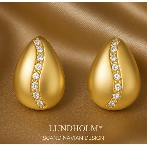 Lundholm Kora – Druppel Oorstekers met Zirkonia – Goudkleurig Lundholm Kora – Druppel Oorstekers met Zirkonia – Goudkleurig