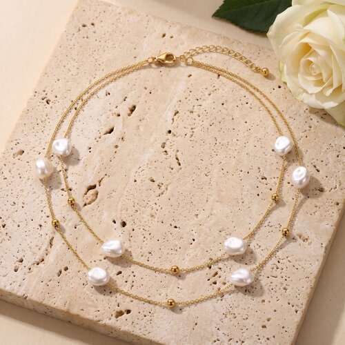 Lundholm Mirabelle – Layered Parelketting met Barokparels – Goudkleurig Lundholm Mirabelle – Layered Parelketting met Barokparels – Goudkleurig
