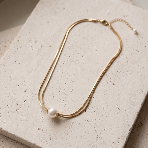 Lundholm Lundholm Margaux Parelketting Dames Goudkleurig - Ketting met Grote Parel - Dubbele Slangenketting - Gold Plated - Elegante Parel Ketting Goud - Cadeau voor Haar Lundholm Lundholm Margaux Parelketting Dames Goudkleurig - Ketting met Grote Parel - Dubbele Slangenketting - Gold Plated - Elegante Parel Ketting Goud - Cadeau voor Haar