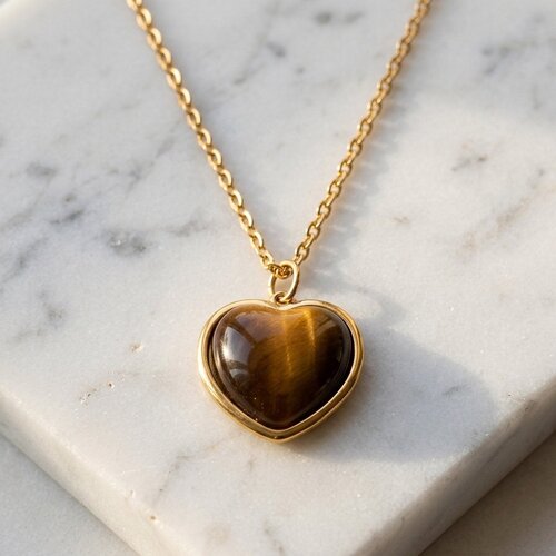 Lundholm Lundholm Beatrice Tijgeroog Hartjes Ketting Dames Goudkleurig - Ketting met Hart Hanger van Tijgeroog - Natuursteen Ketting - Premium Stainless Steel Gold Plated - 50 cm - Waterproof & Hypoallergeen Lundholm Lundholm Beatrice Tijgeroog Hartjes Ketting Dames Goudkleurig - Ketting met Hart Hanger van Tijgeroog - Natuursteen Ketting - Premium Stainless Steel Gold Plated - 50 cm - Waterproof & Hypoallergeen