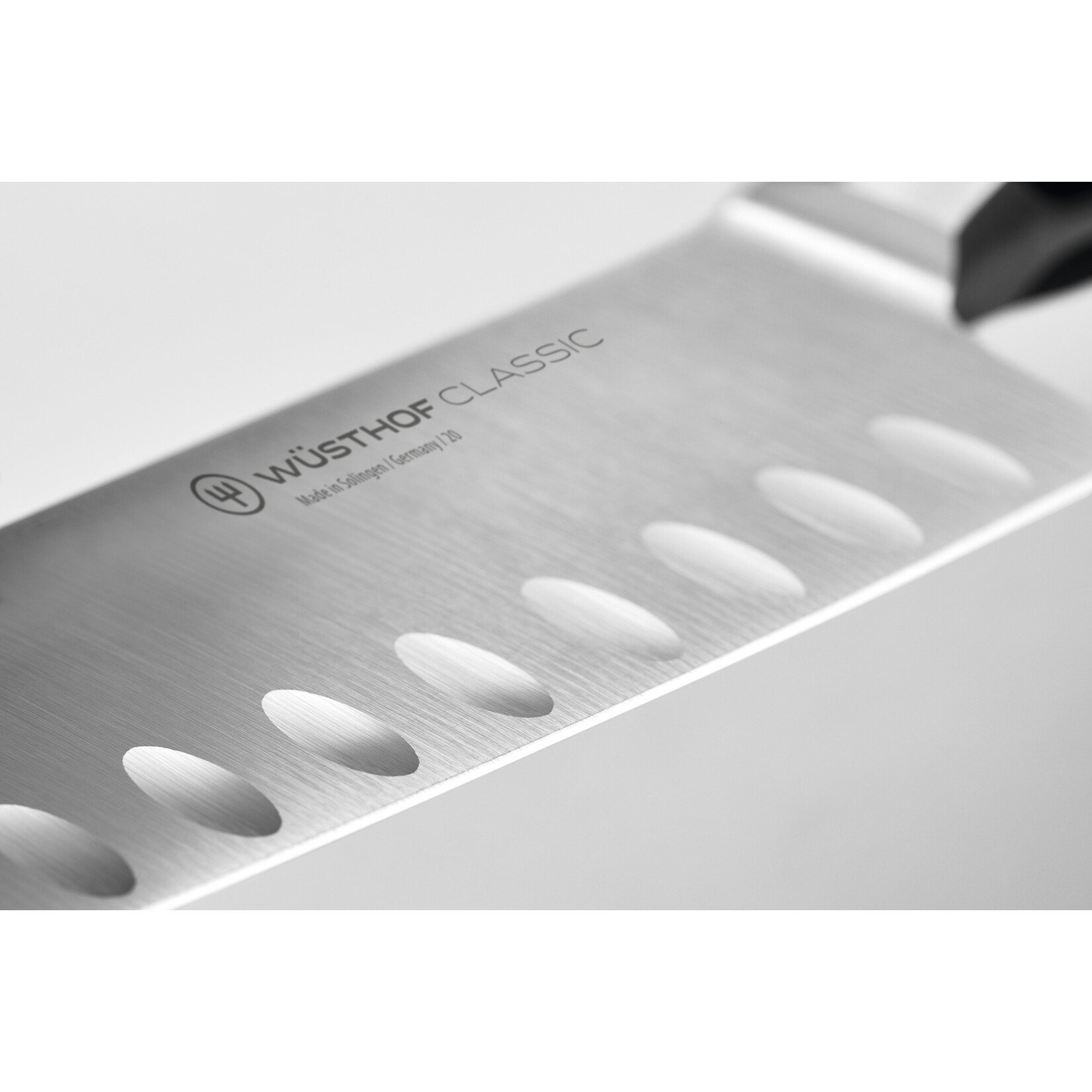 Wüsthof, messen uit Solingen gemaakt onder leiding van de 5e generatie familie Wusthof 17 cm Santoku mes Wusthof Classic Santokumes 17 cm Classic Black Wusthof 1040131317