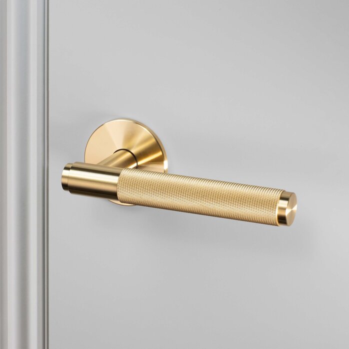 Buster and Punch Door handle in Gold Messing with Cross Pattern - Sprung
