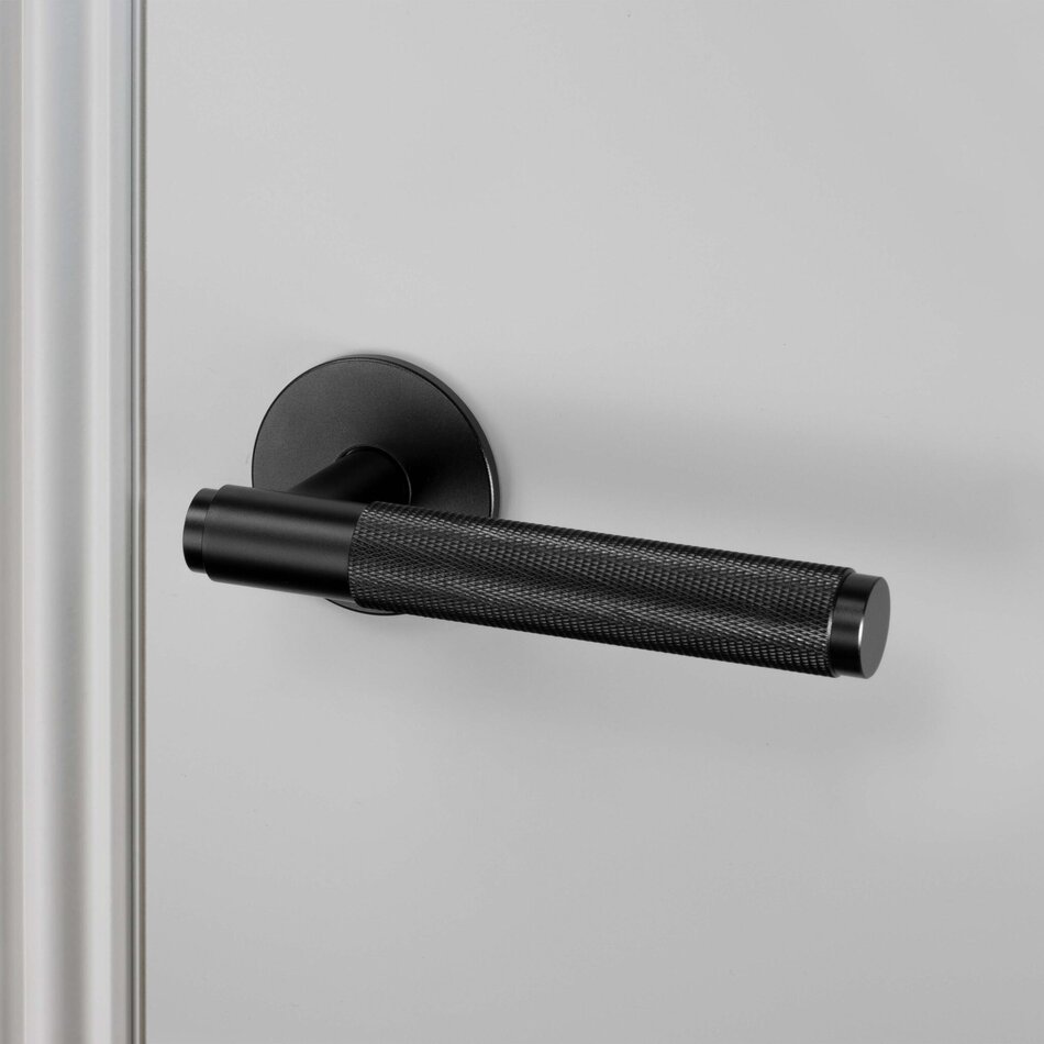 Buster and Punch Door handle in Black with Cross Pattern - Sprung