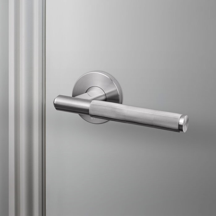 Buster and Punch Fixed Door Handle in Steel with Linear Pattern - Single-Sided