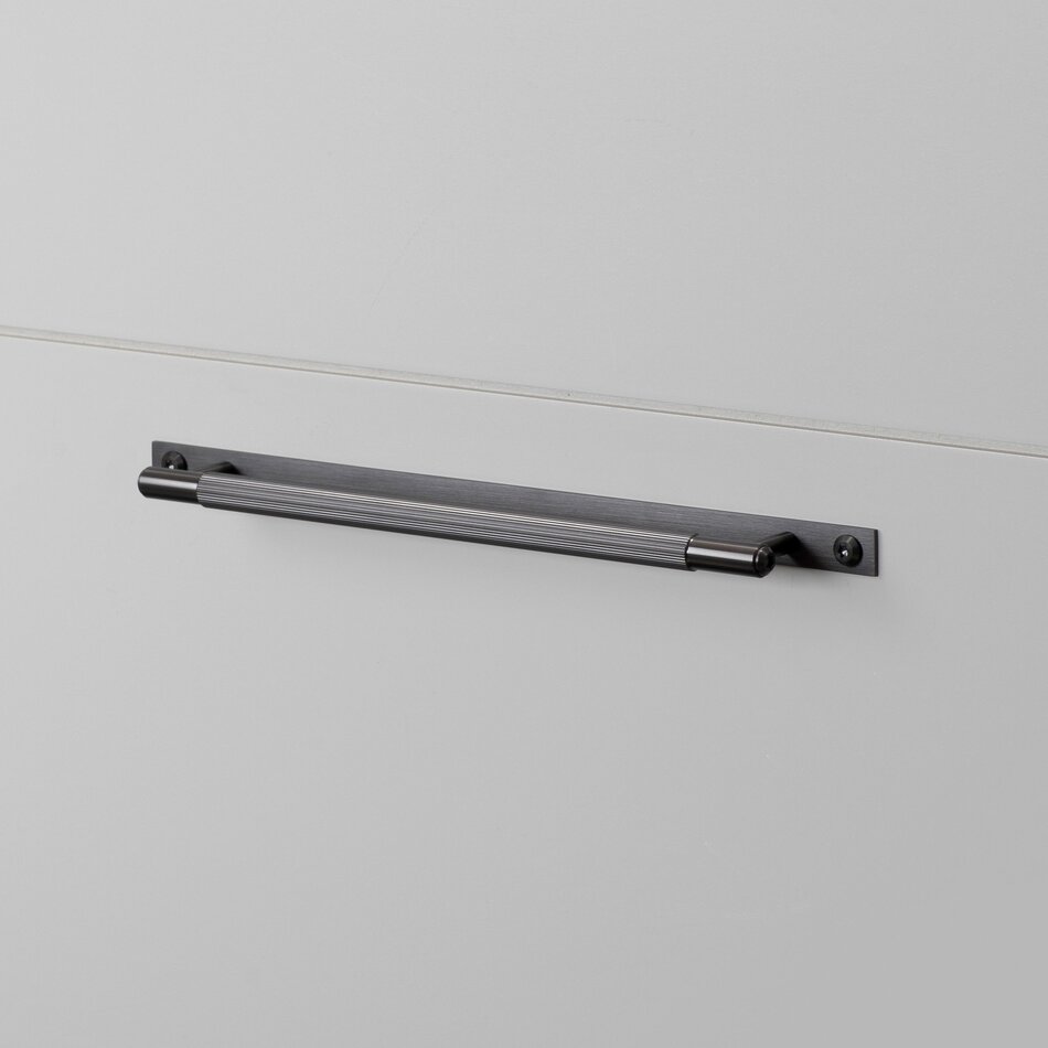 Buster and Punch Furniture Pullbar on Plate in Gun Metal with Linear Pattern Buster and Punch Furniture Pullbar on Plate in Gun Metal with Linear Pattern