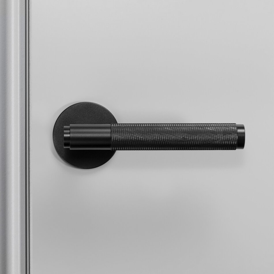 Buster and Punch Door handle in Black with Cross Pattern - Sprung