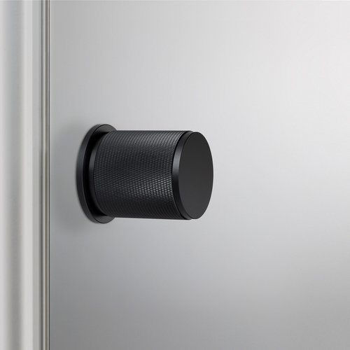 Buster and Punch Door Knob in Black with Cross Pattern