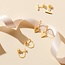 Selected gold colored set of earrings