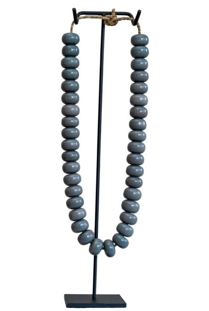 Kralenketting op statief