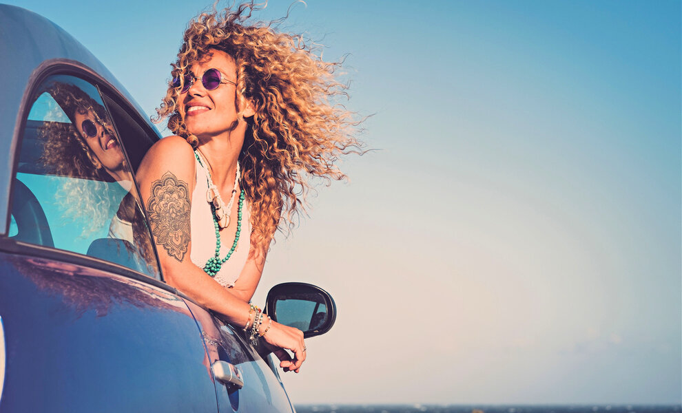 Krullen,  zon, zee en strand.