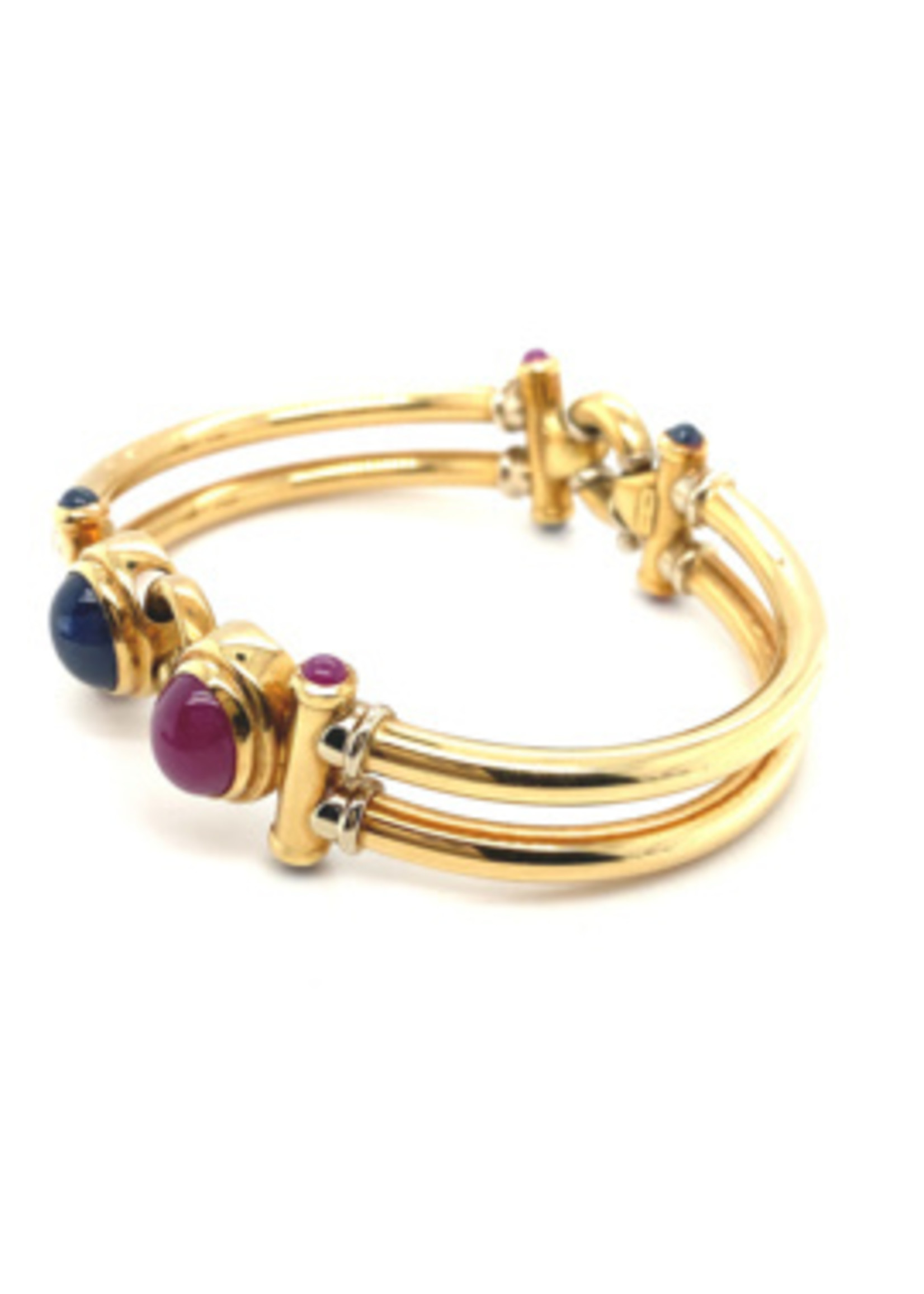 Vintage & Occasion Occasion gouden 18k bangle met robijnen en saffieren