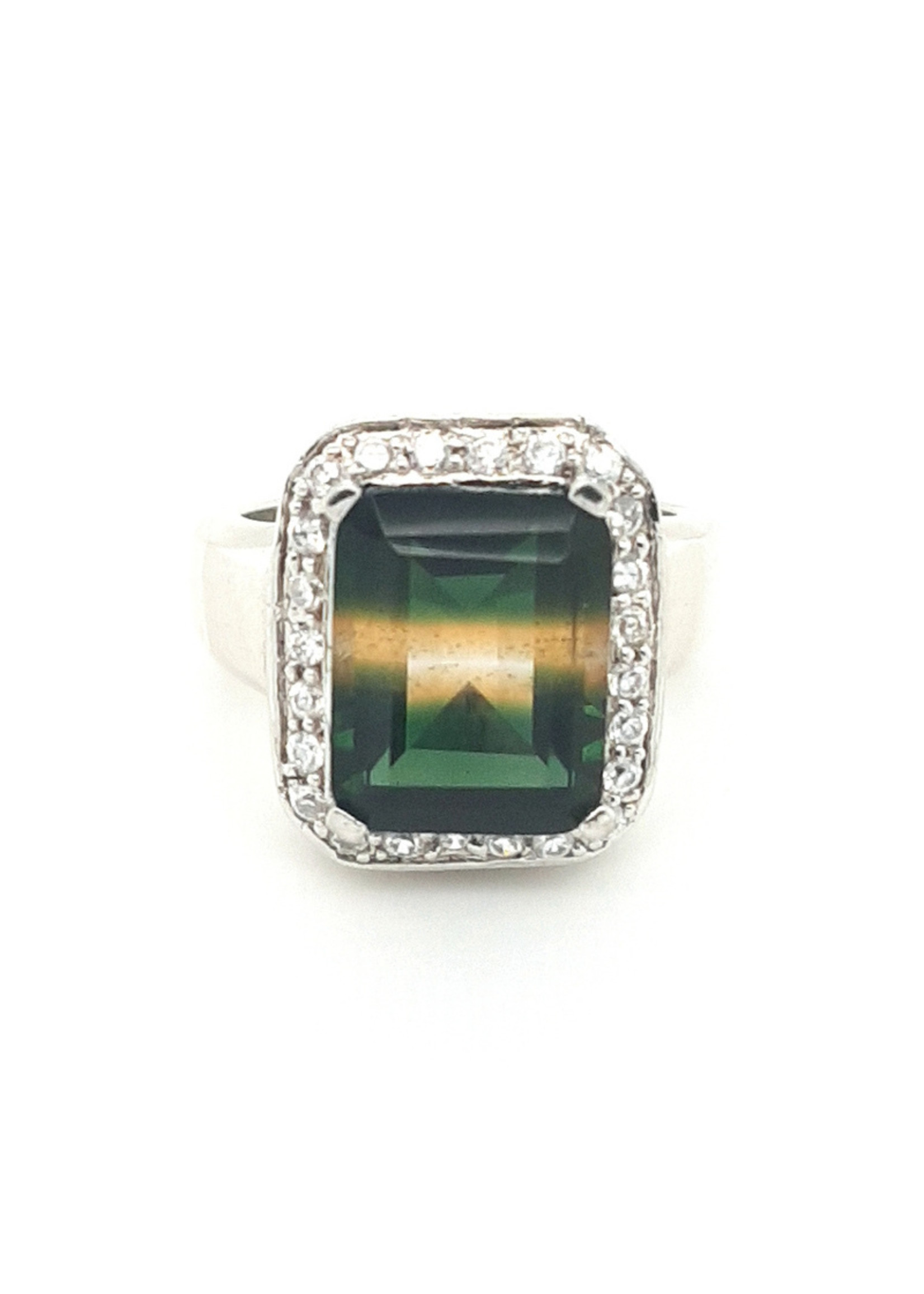 Vintage & Occasion Occasion zilveren ring rijkelijk bezet met zirkonia's en een groen gele steen