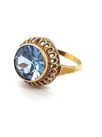 Vintage & Occasion Occasion gouden ring met een blauwe synthetische topaas