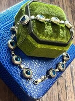 Vintage & Occasion Occasion gouden armband met allziend oog schakels