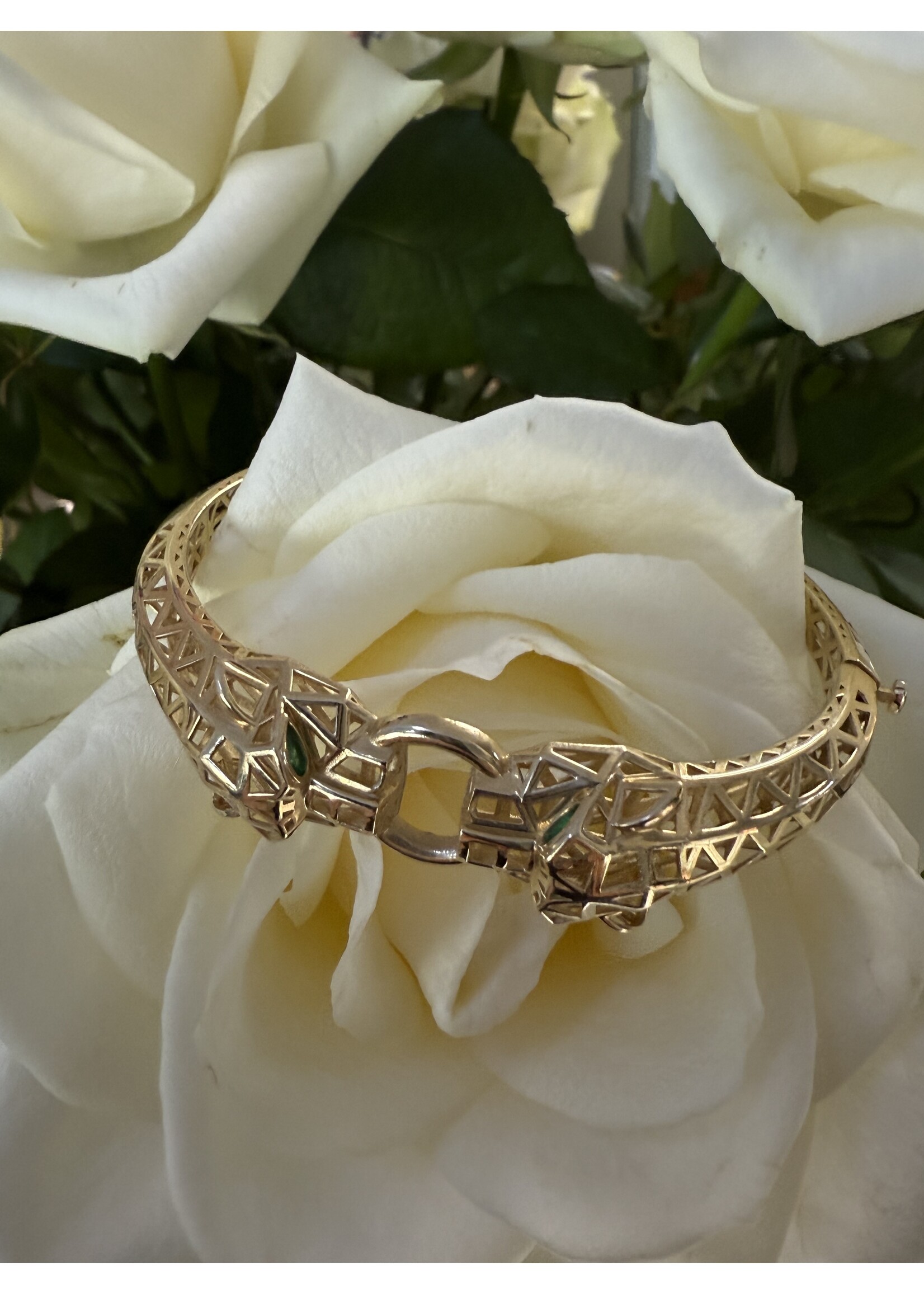 Vintage & Occasion Geelgouden 14k  armband panters 3d met groene edelsteen ogen