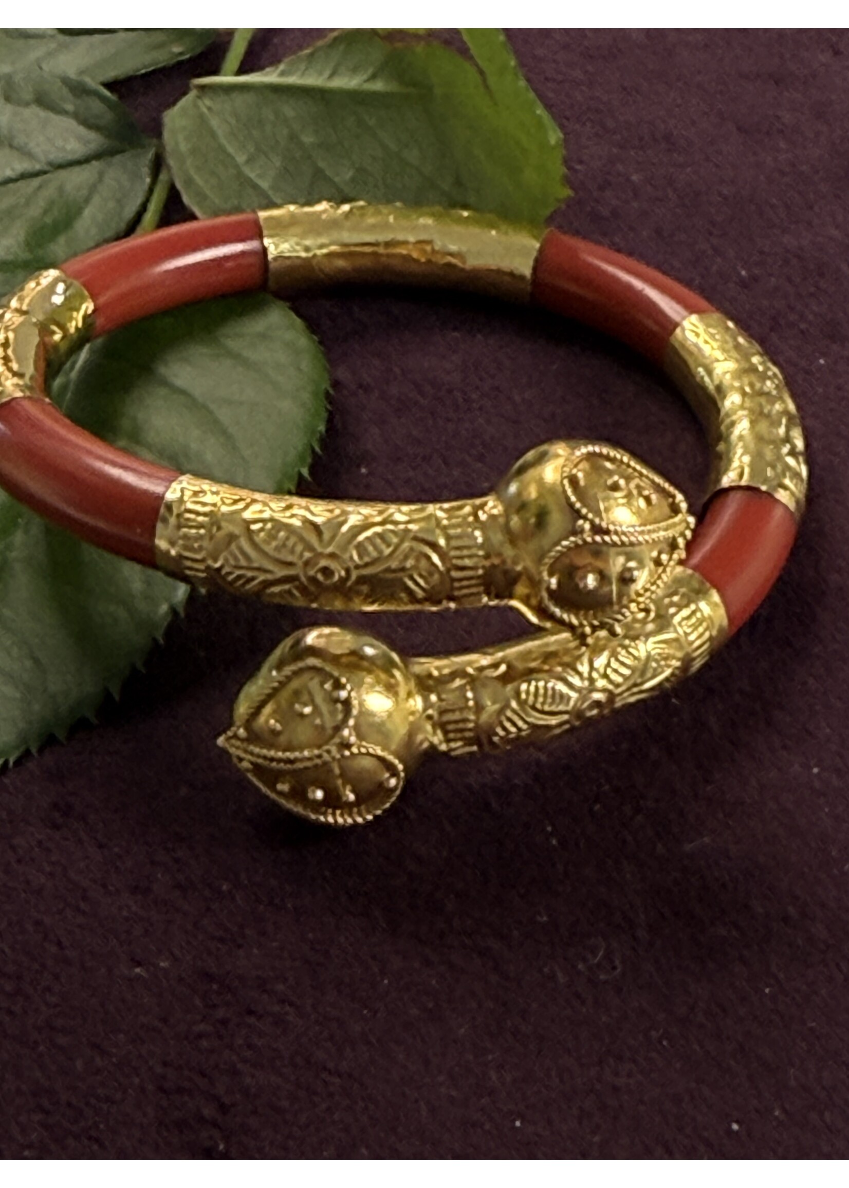 Geelgouden Surinaamse boei armband met goud