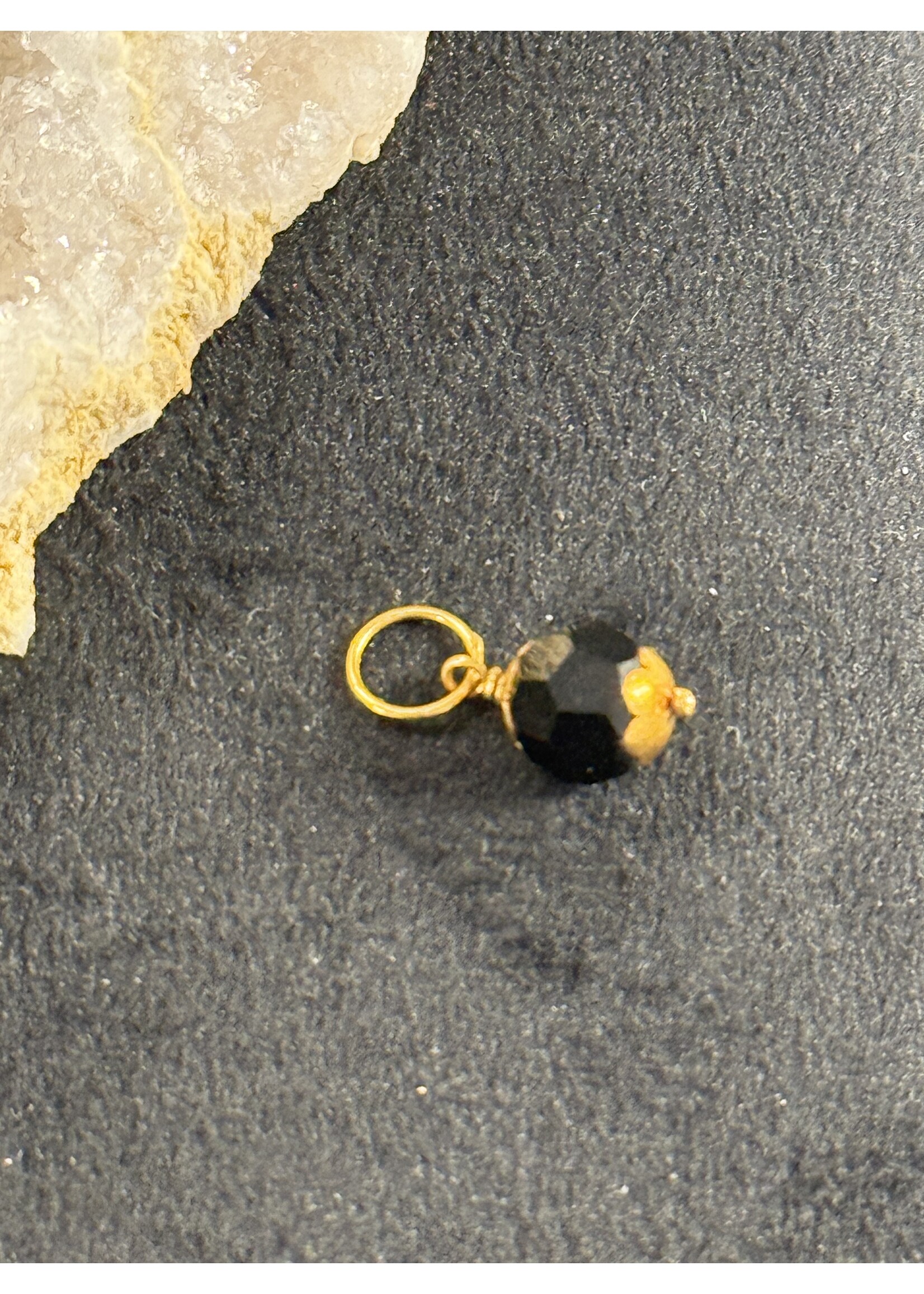 Vintage & Occasion Geelgouden Surinaamse gelukskraal orgi eye zwart