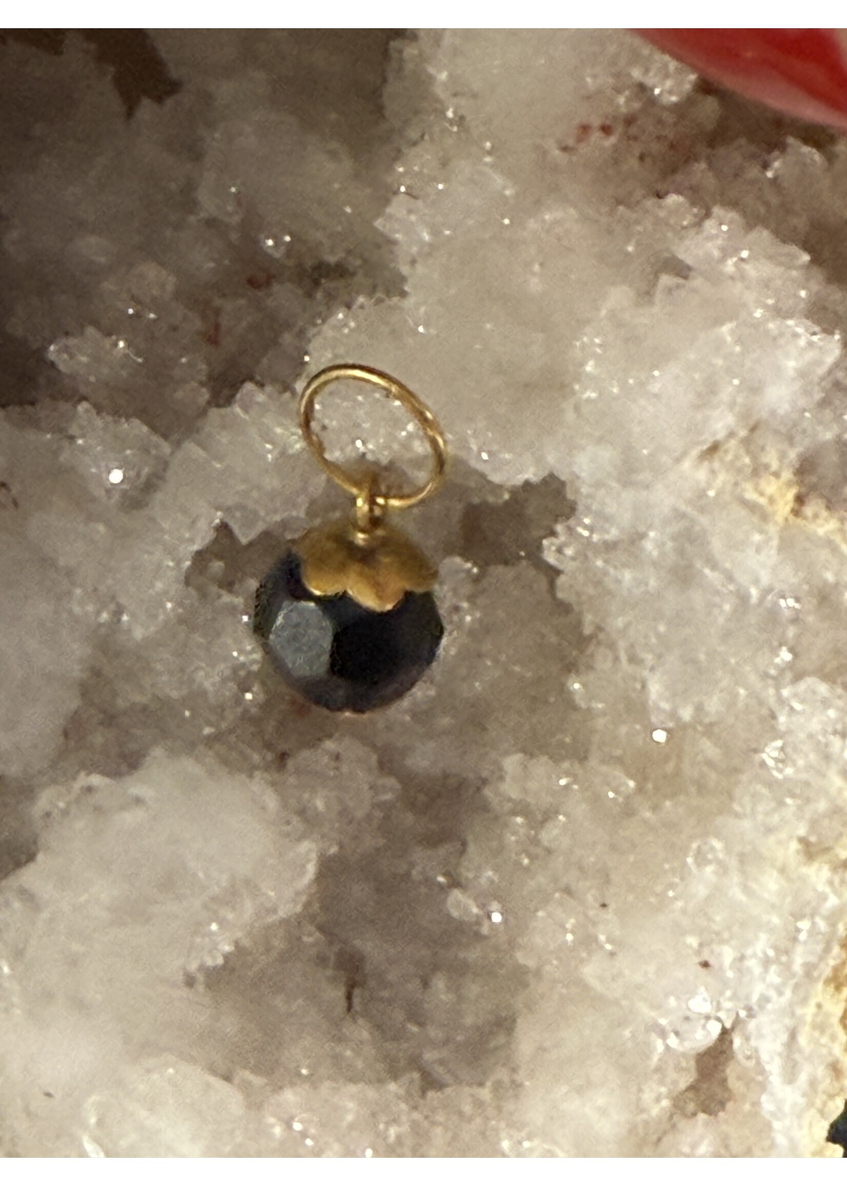 Vintage & Occasion Geelgouden Surinaamse gelukskraal orgi eye zwart